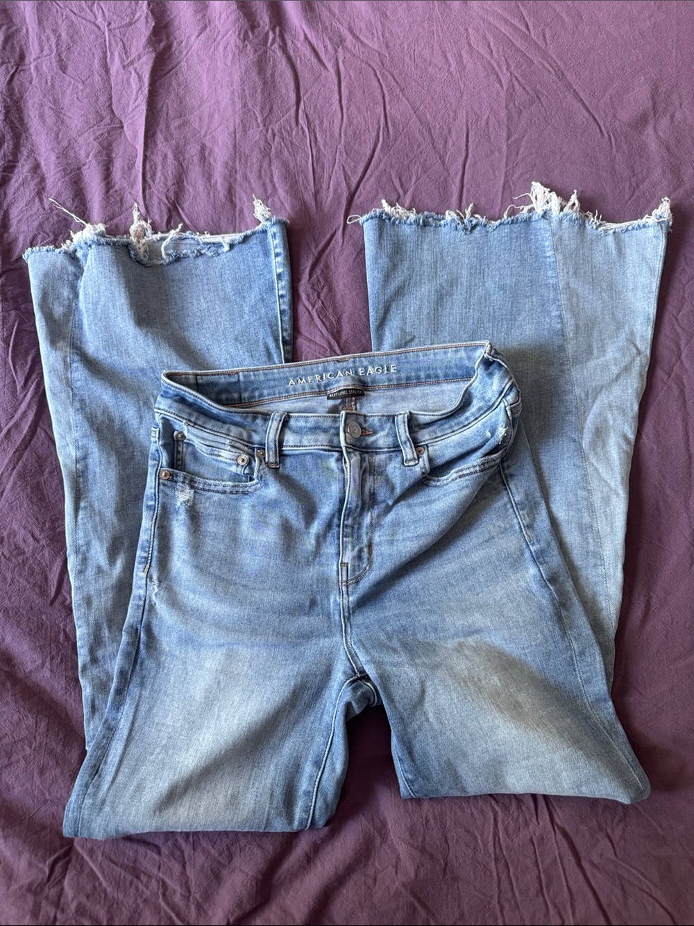 American Eagle Outfitters Light Blue Frayed Hem High-Rise Jeans